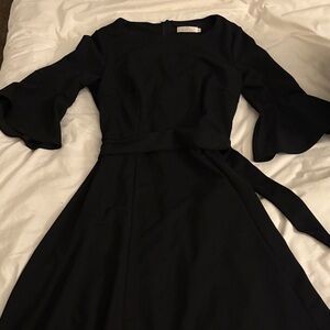 Elegant Black Dress with Flared Sleeves
